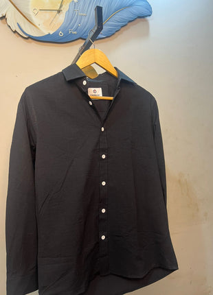 A long-sleeve button-up shirt