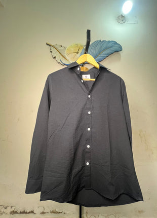 A long-sleeve button-up shirt